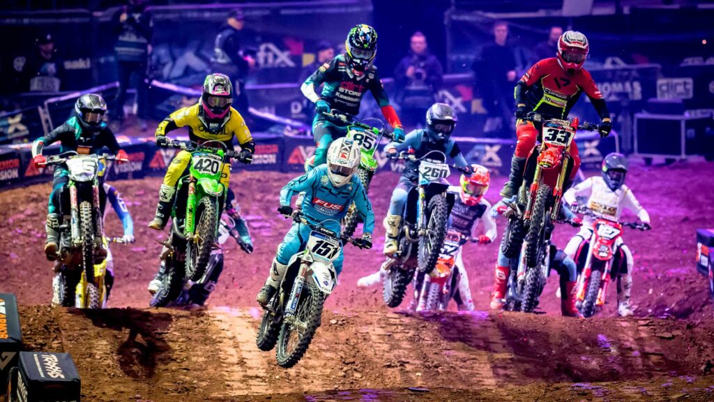 Arenacross riders racing indoors at bp pulse LIVE in Birmingham